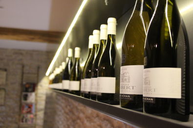 Domaine Thibert Bottles on the Wall